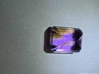 Front view of octagon-cut ametrine showing bicolor zones