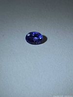 Oval-cut tanzanite gemstone front view