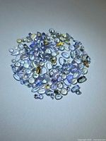 Top view of full parcel of mixed tanzanite gemstones