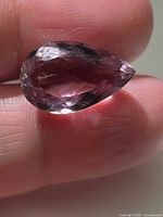 Pear cut amethyst profile view showing facet pattern