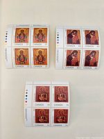 All three stamp blocks laid out showing denominations and margins