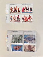 Both 39¢ stamp panes together showing entire designs and selvage