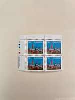 Front view of the mint block of four Canadian 36¢ Parliament stamps with selvedge