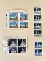 Overall lot showing two 37¢ blocks and one 38¢ vertical strip