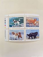 Full view of mint Canada 37¢ dog stamp block with selvage