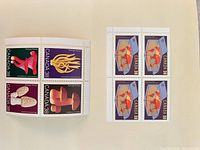 Both stamp blocks side by side on backing sheet