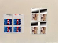 Both blocks side by side showing full perforations and registration margins