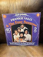 Front cover of double LP showing title and 40 original songs text