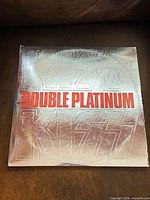 Front of silver-foil gatefold jacket with album title