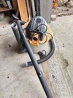 Full view of Ridgid WD09450 shop vacuum with hose and wands