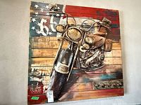 Full view of square wall art showing motorcycle relief and flag background