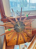 Front view of Westclox starburst clock showing full design