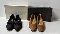 Black and brown suede flat shoes pairs with their original boxes