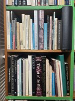 Two shelves filled with architecture and printmaking books
