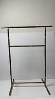 Full view of brass bamboo-style rack