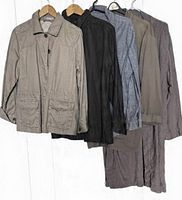 Five lightweight jackets hanging side by side