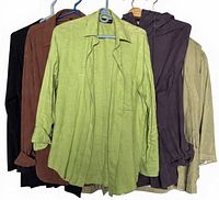Group shot of five garments on hangers showing colours and styles