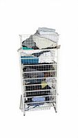 Stacked wire drawers filled with folded clothing