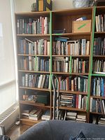 Front view of the two joined bookcases showing shelves and overall design