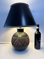 Full view of lamp with shade and base