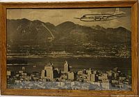 Framed sepia advertisement print showing aircraft over Vancouver
