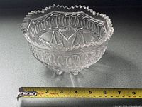 Side view showing rim pattern, body design and tape measure for scale
