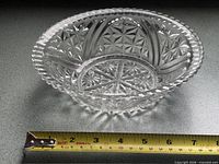 Side view showing pattern and measuring tape indicating diameter