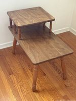 Oblique view of two-tier wooden end table