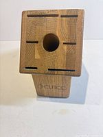 Top view showing seven slots including central round slot