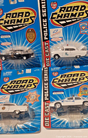Group shot of all four sealed Road Champs police cars