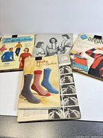 Top view showing four primary magazines and leaflets in lot