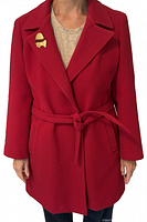 Front view of red wool coat on model showing belt and lapels