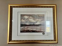 Framed print on wall showing complete frame and mat