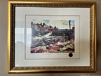 Framed print hanging on wall