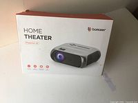 Front of retail box showing Bomaker S5 projector image and branding