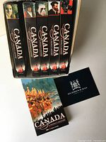 Front view showing five tape spines in slipcase and booklets