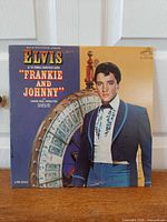 Front jacket showing album title, Elvis image, catalog number LPM-3553