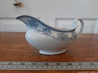 Right side view showing blue floral pattern and overall shape