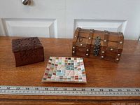 All three storage pieces with ruler for scale