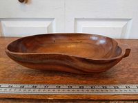 side profile showing bowl depth and grain