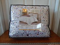 Packaged Intelligent Design bedding set front view