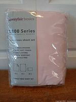Front view of sealed Wayfair Basics 1800 Series twin sheet set package