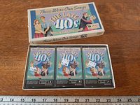 Slipcase exterior and three cassette cases inside