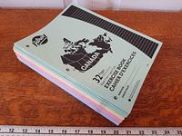 Stack of Hilroy Canada exercise books showing front cover design