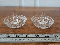 Both Zajecar crystal ring holders side by side with ruler for scale