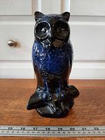 Front view of Blue Mountain Pottery owl figurine showing glaze and perch