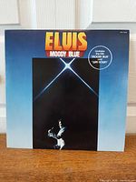 Front cover of Elvis Presley Moody Blue LP showing artwork and catalog number AFL1-2428