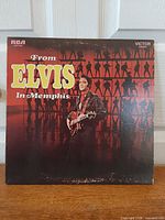 Front album sleeve with title and Elvis image