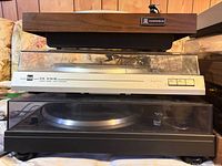 Stack of three turntables Candle top, Dual middle, Hitachi bottom