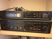 Both LXI units stacked on shelf